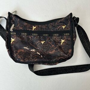 Lesportsac Tinkerbell Black Crossbody with Bronze Map Print
